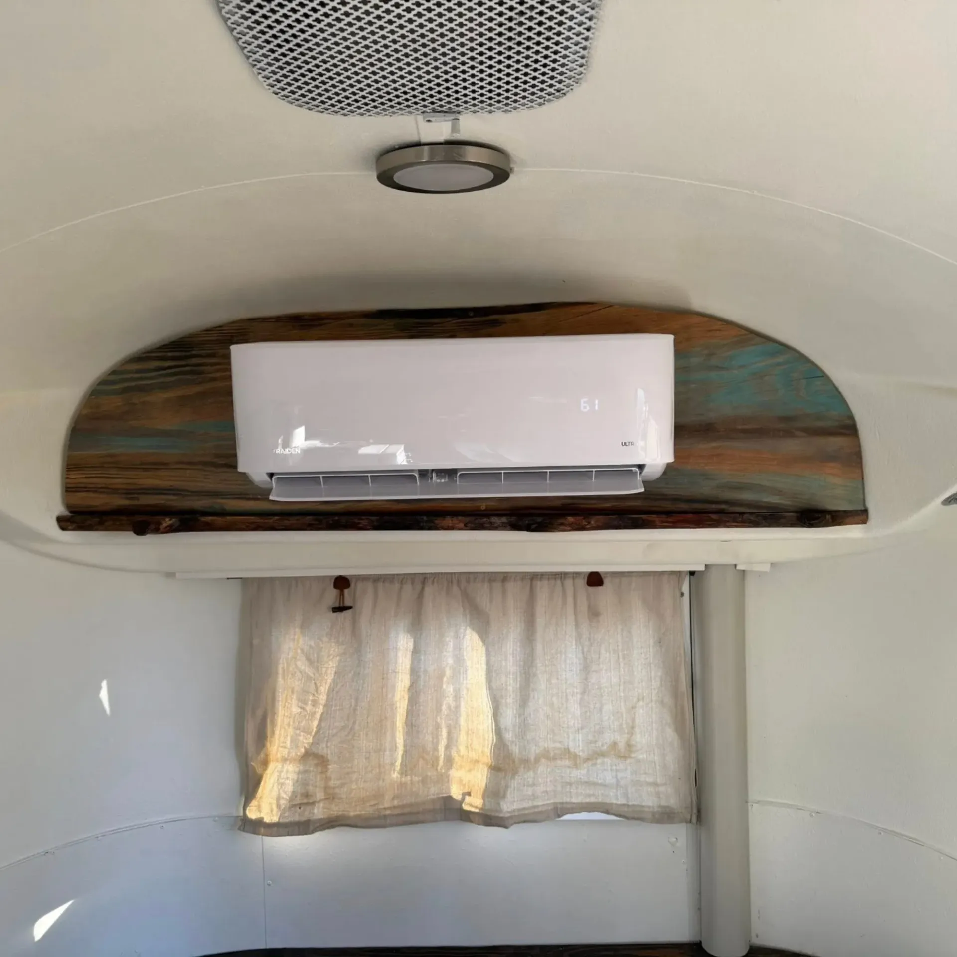 LCS Heating And Cooling - A room with a window and a ceiling fan