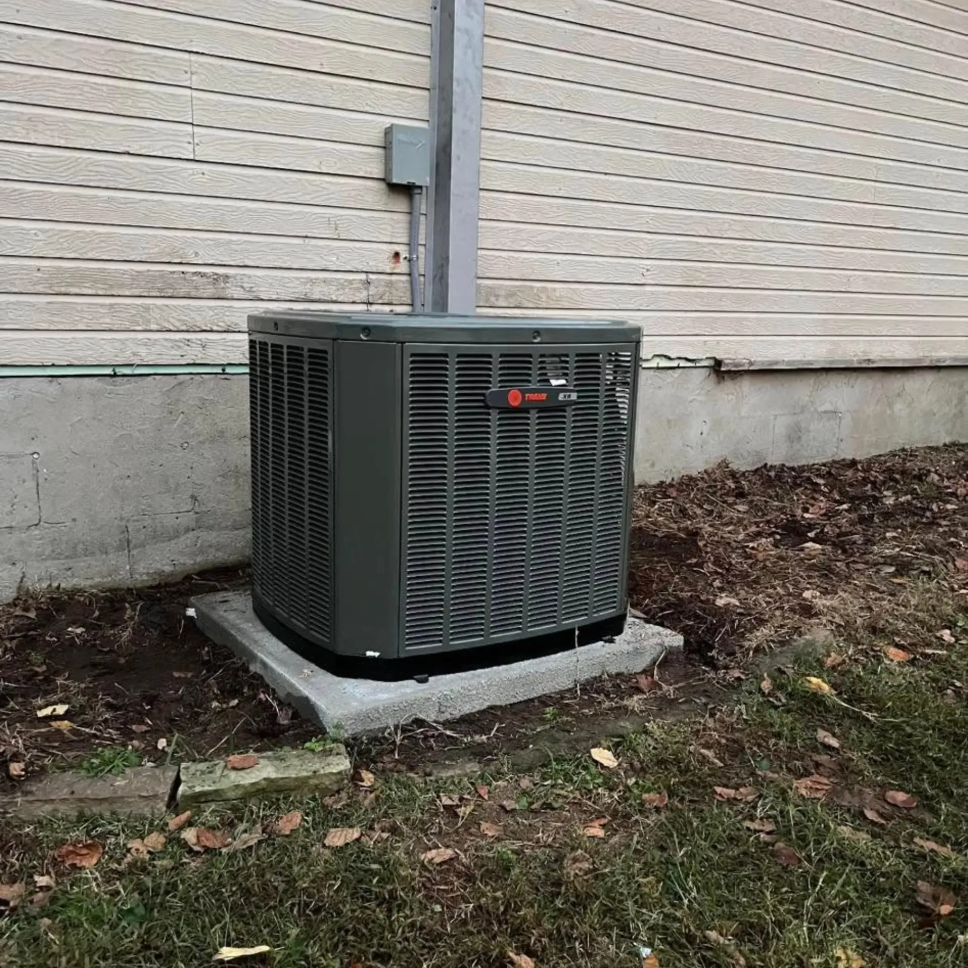 LCS Heating And Cooling - A large gray box with the word Trane on it