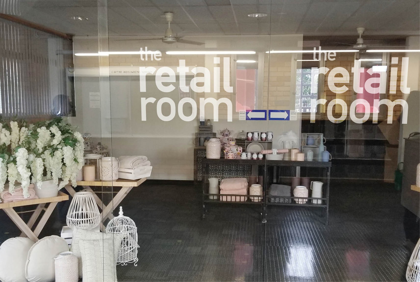 Sydney graphic designer, Sydney graphic design business, tafe, tafe nsw, the retail room, logo on glass window