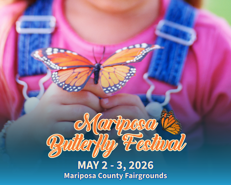 A person in blue overalls holds a monarch butterfly. Text reads: Mariposa Butterfly Festival, May 2-3, 2026, Fairgrounds.