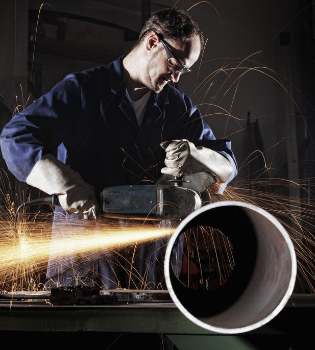 Welder Cutting Pipe — Labour Hire Specialists In Townsville, QLD