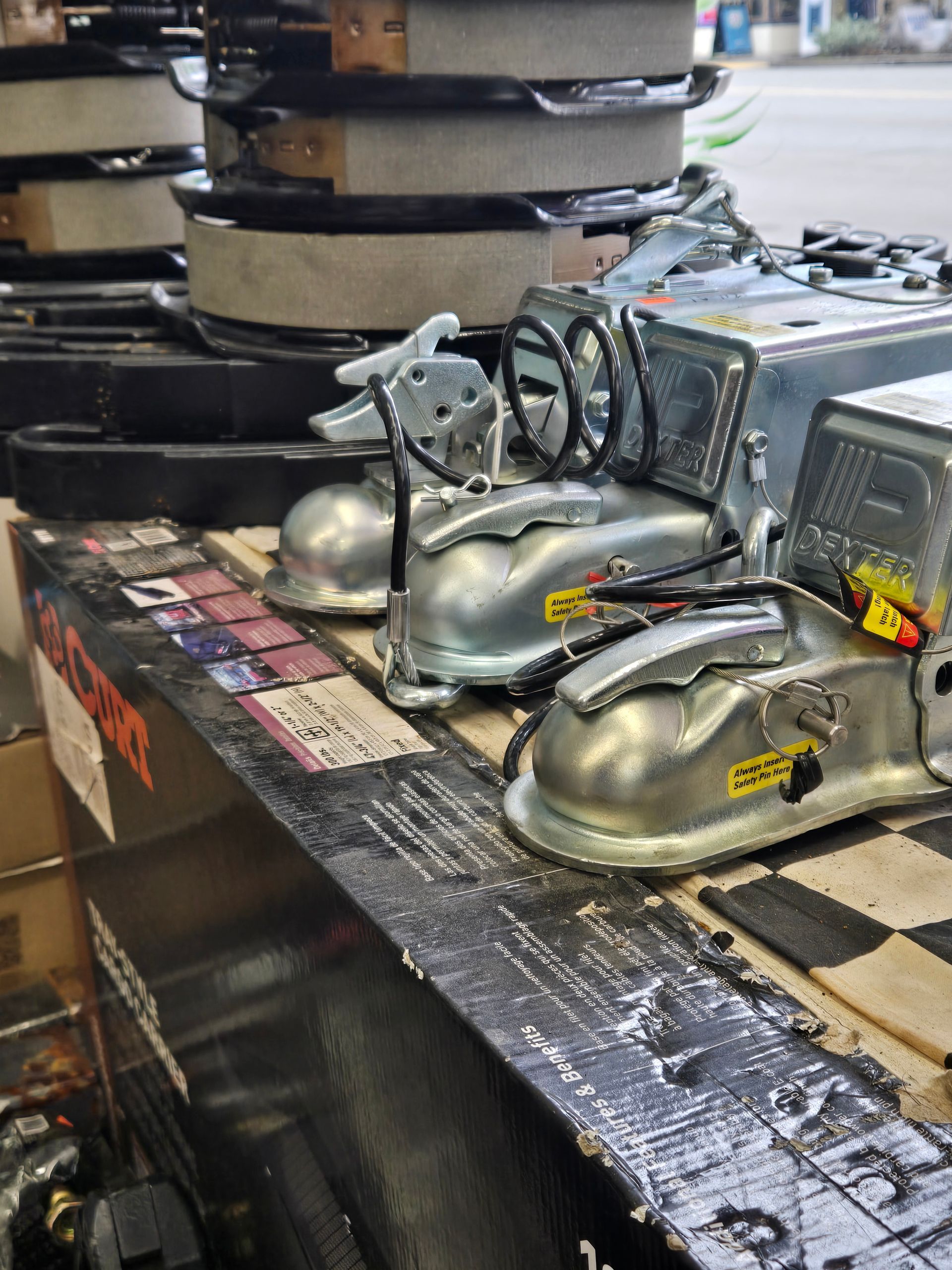 A bunch of metal objects are stacked on top of each other on a table.