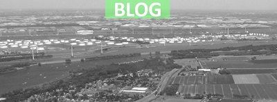 Blog over het overgangsrecht Omgevingswet met afbeelding van Havengebied Rotterdam en Oostvoorne
