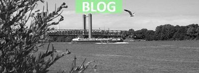 Blog over exploitatie van een schip met afbeelding van schip op Oude Maas, Spijkenisse / Hoogvliet