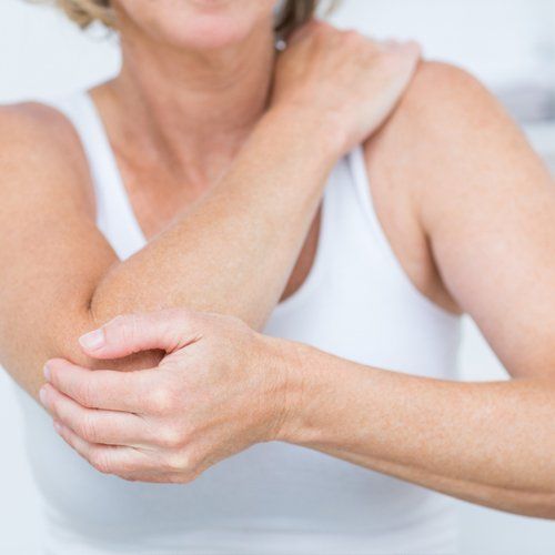 Pain In Joint — Woman Having Elbow Pain in Concord, CA
