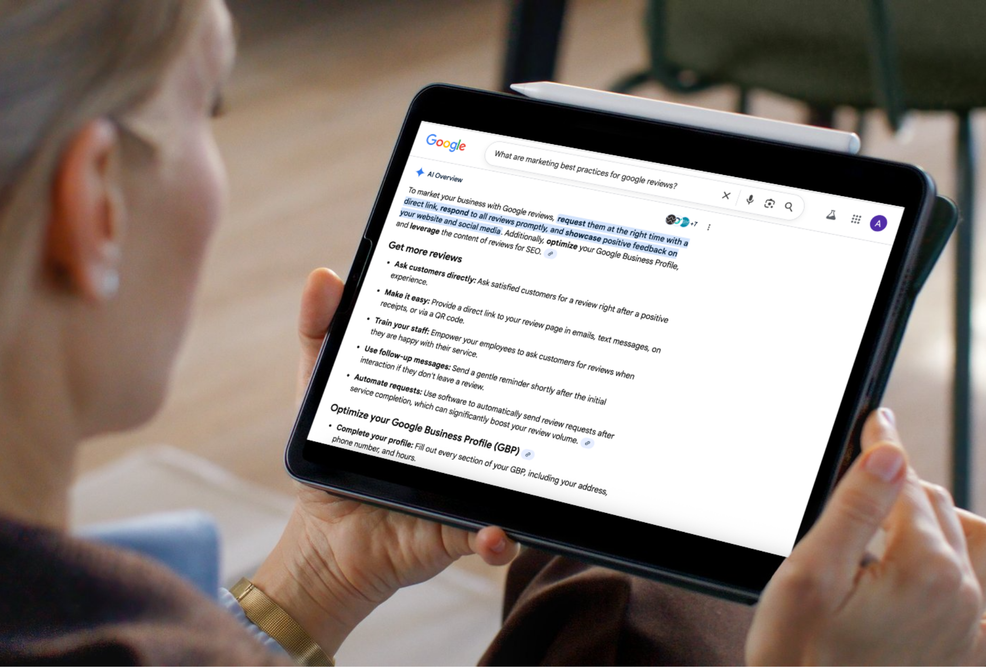 Woman looking at Google AI-powered search results on her iPad.
