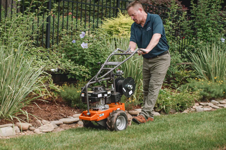 There is a before and after picture of a lawn.