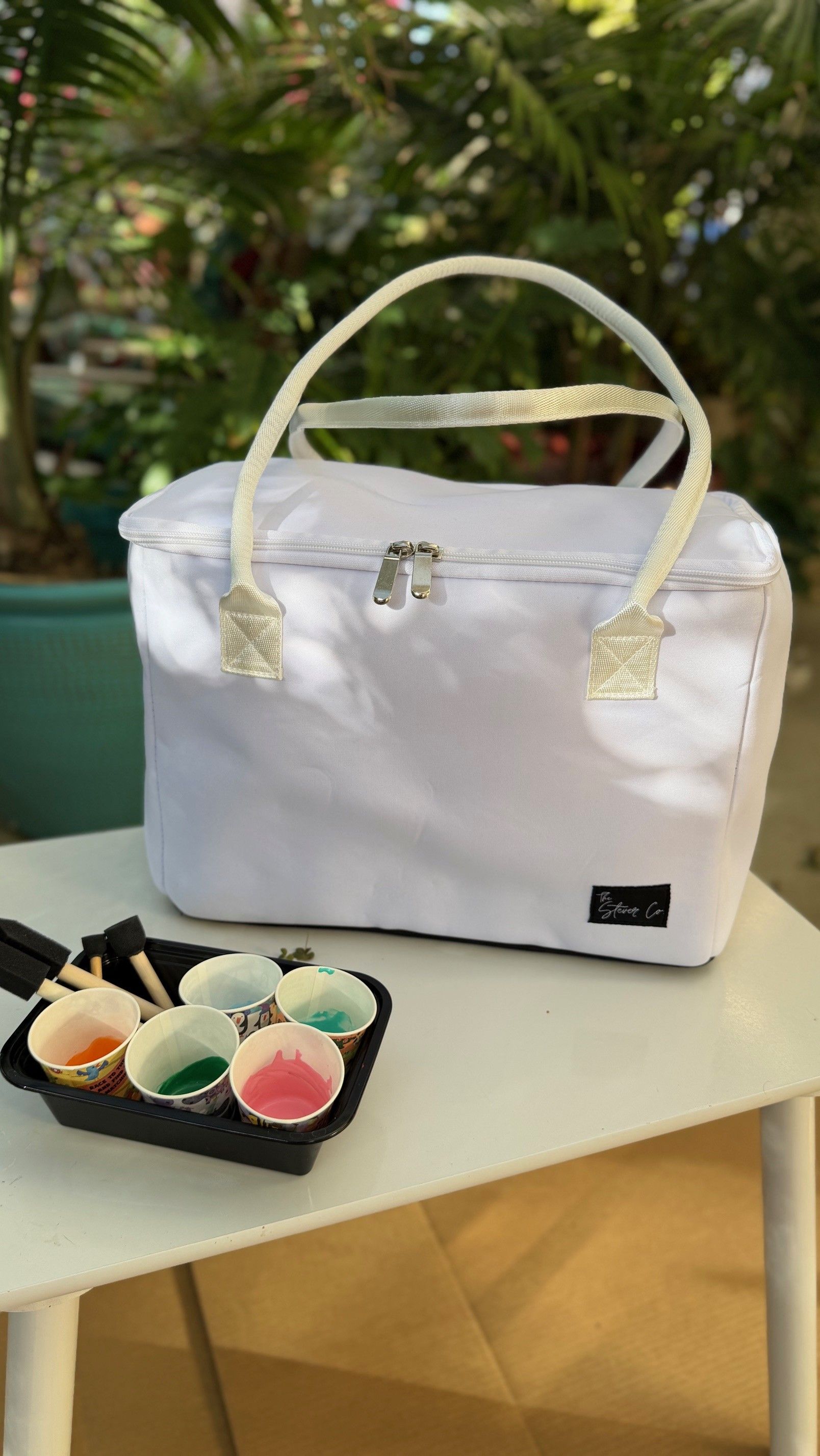 The Stever Co Mom’s Favorite insulated tote with paint supplies ready for handprint personalization