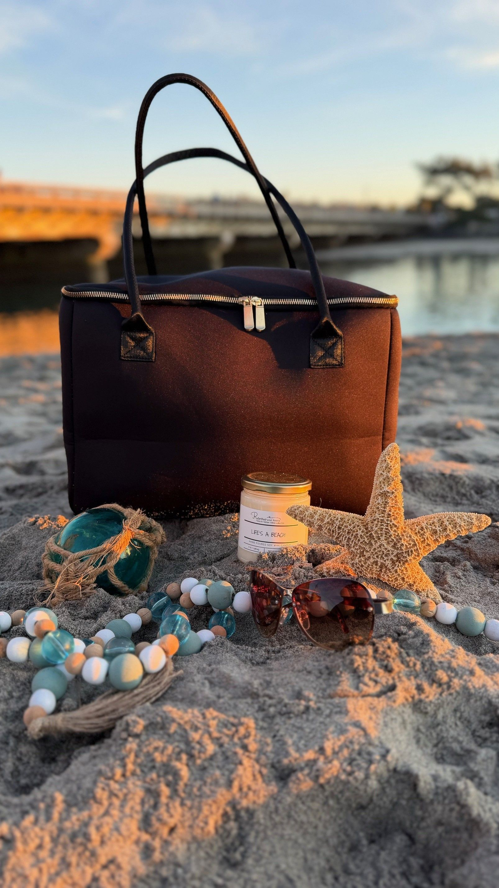 The Birdie insulated tote bag by The Stever Co at Del Mar waterfront sunset