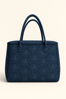 Tentacle & Tide insulated tote bag by The Stever Co with navy octopus pattern