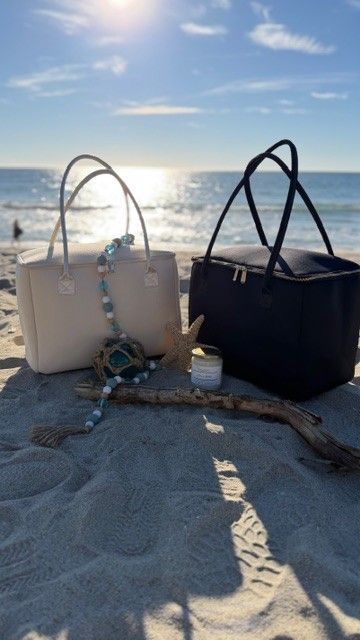 Salt & Stone and Birdie insulated tote bags by The Stever Co on Carlsbad beach