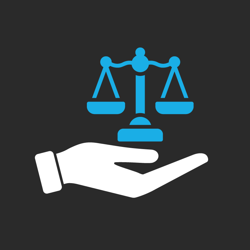 A hand is holding a scale of justice on a black background.