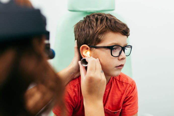 Boy at Ears Examination — Norcross, GA — Y.H. Parikh & Associates