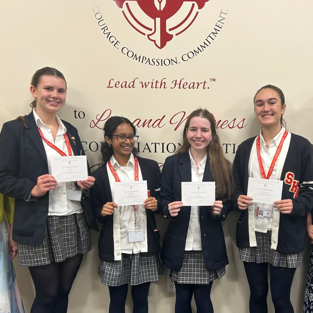 Four Sacred Heart Academy students being honored