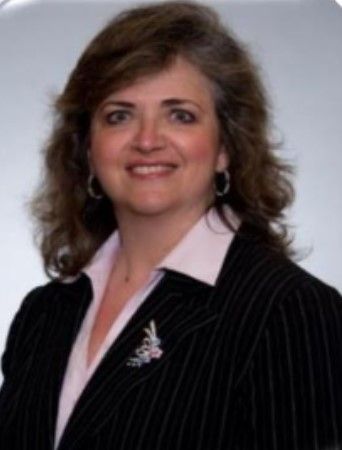 IRENE VILLACCI, ESQ. '82