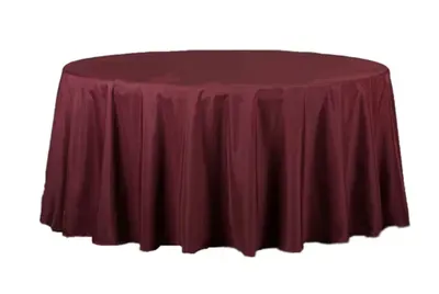 Burgundy round tablecloth, covering a table.