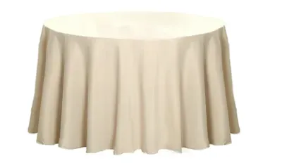 Beige round tablecloth on a table.