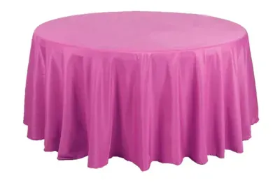 Pink round tablecloth on a table.