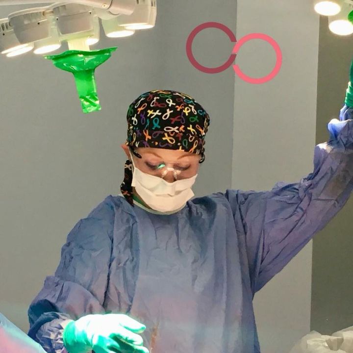 photo of Dr. Hope Sherie in operating room during surgical procedure