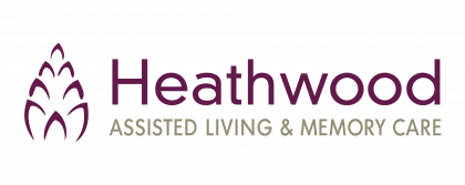 The logo for heathwood assisted living and memory care