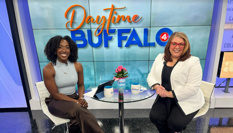 A man and a woman are on a live tv show