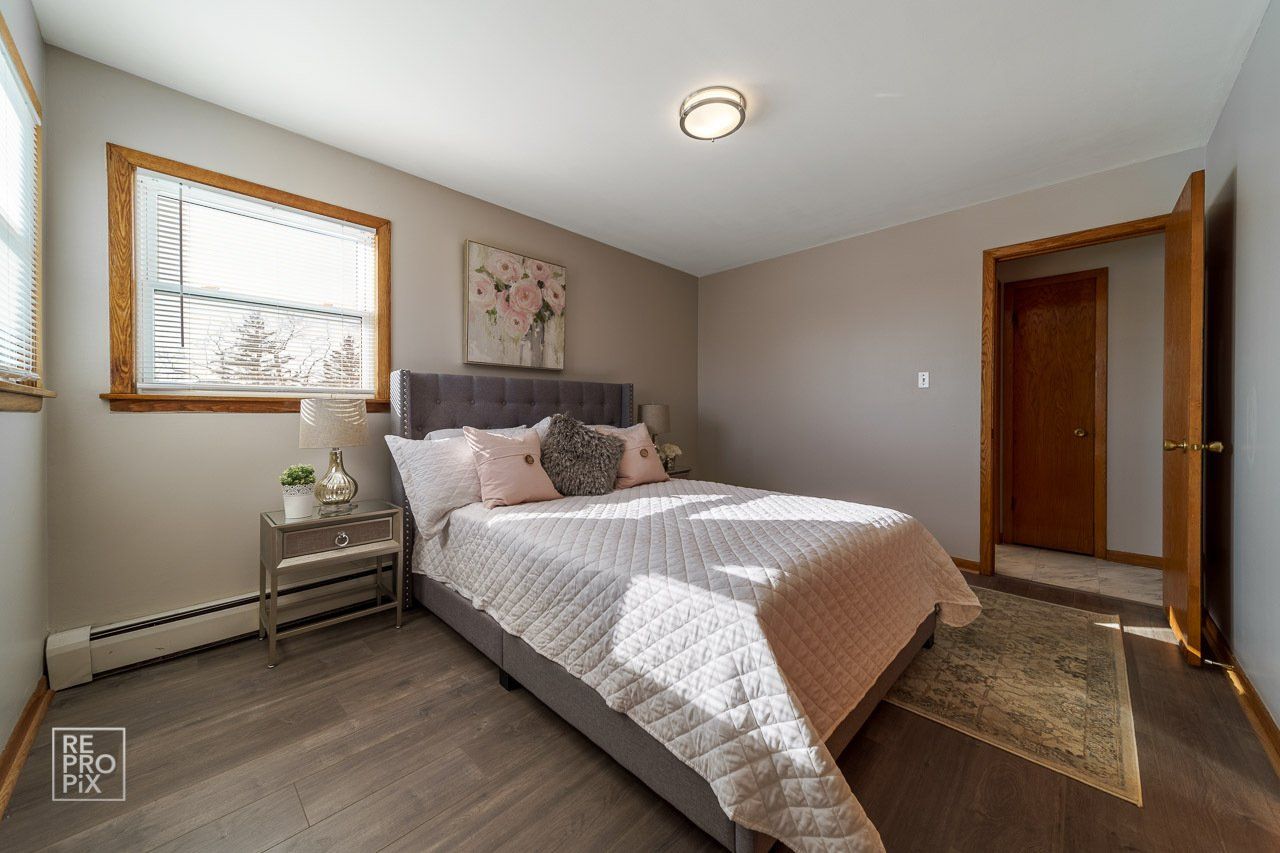 bedroom with hardwood floors