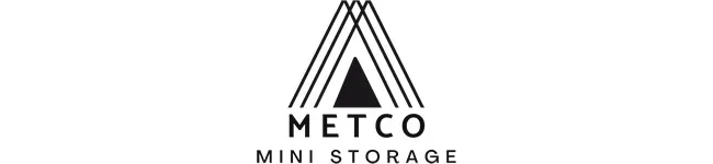 Logo for Metco Mini Storage featuring a stylized triangular roof symbol above the company name.