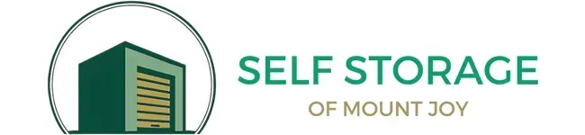 Logo for Self Storage of Mount Joy with a circular icon of a green storage unit building next to the business name.