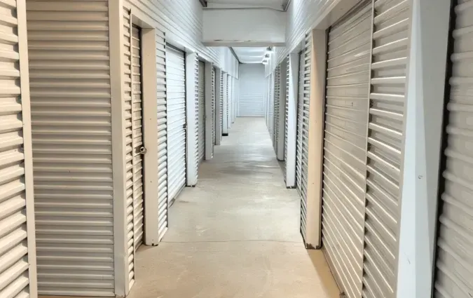 Interior view of a storage unit facility corridor. 