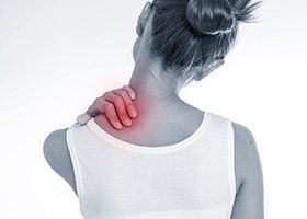 Neck Pain — Woman Having Neck Pain in Jackson, MS