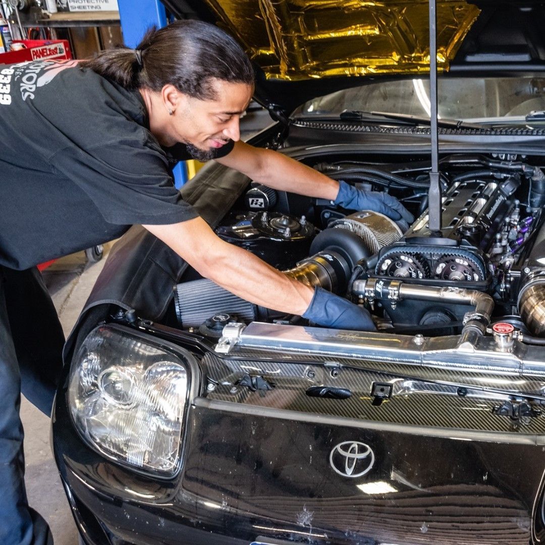 Mechanic working on Asian Vehicle | JCruz Motors