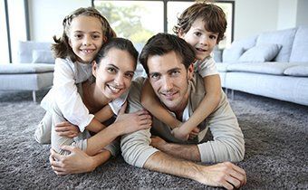 Family lying in Living Room - Carpet Cleaning in Rimrock Carpet Cleaning Redmond, Oregon