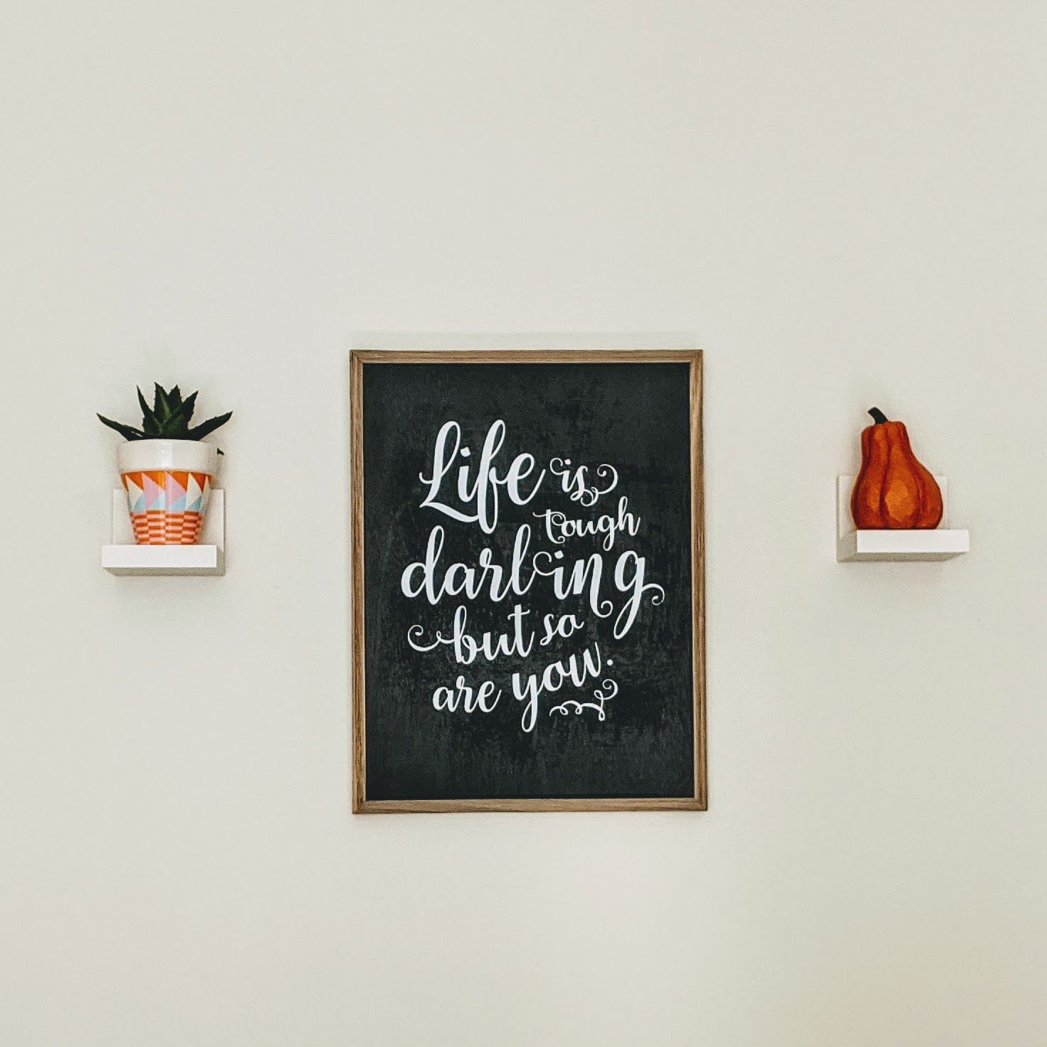 Image of Ott Counseling Office wall, with a quote framed 