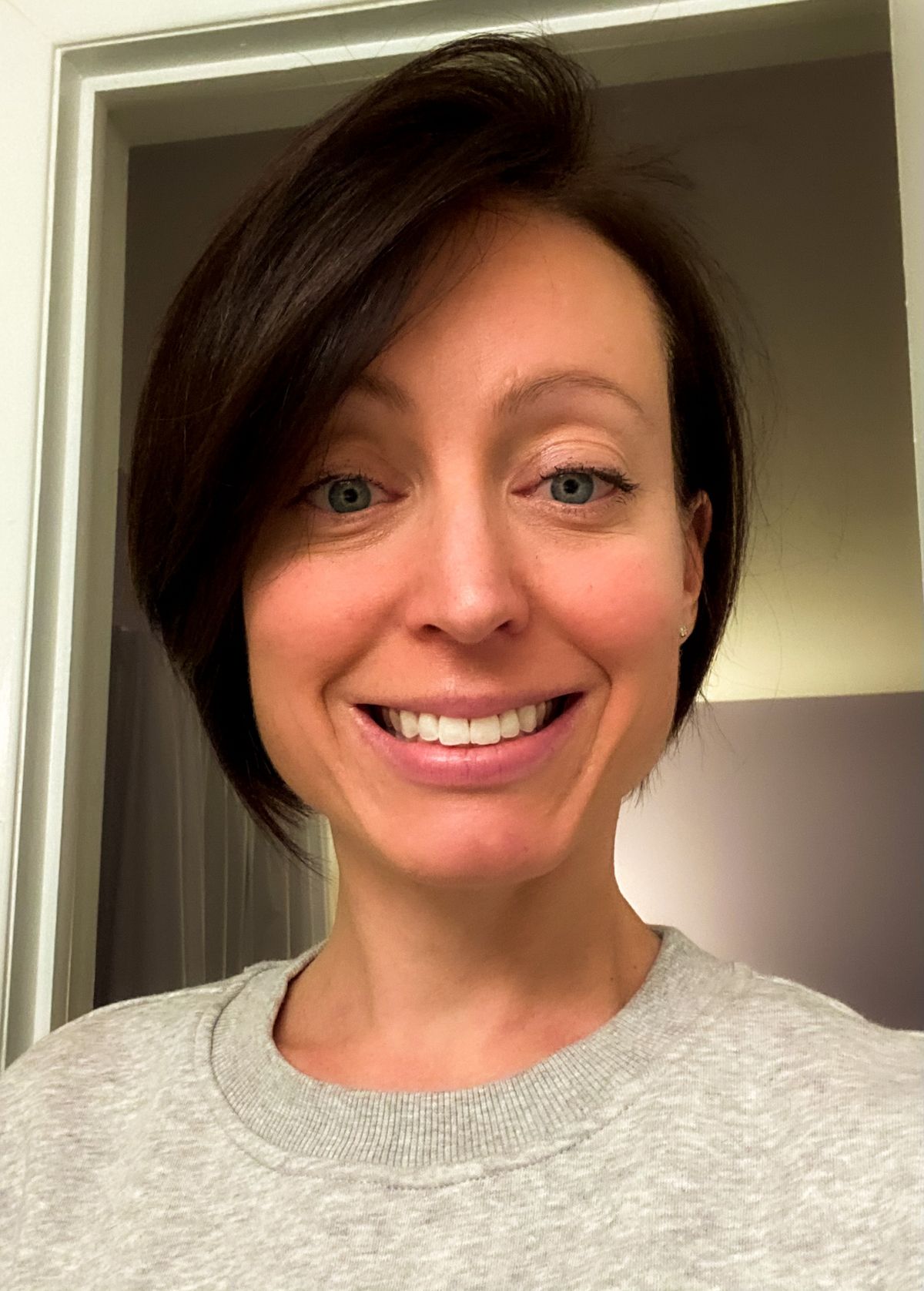 Headshot of Kate Tripi, MS, office coordinator at Ott Counseling