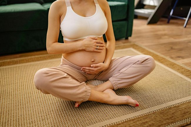 image of a pregnant woman doing yoga