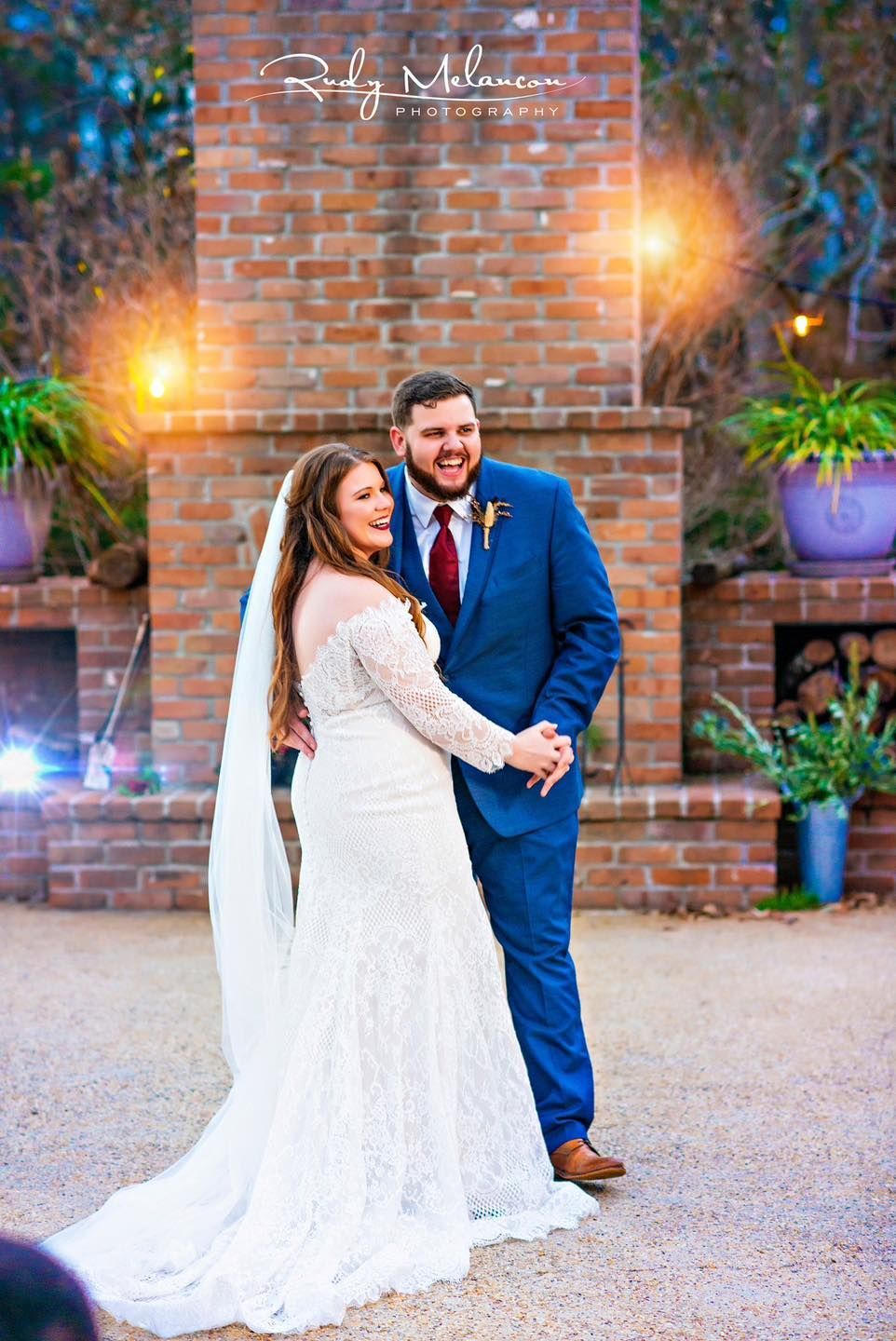 smiling bride and groom