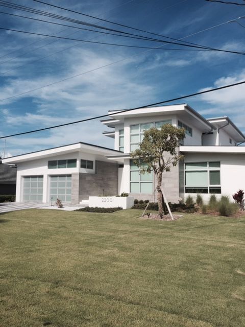 Elegant House With Tree — Naples FL — Garage Doors of Naples