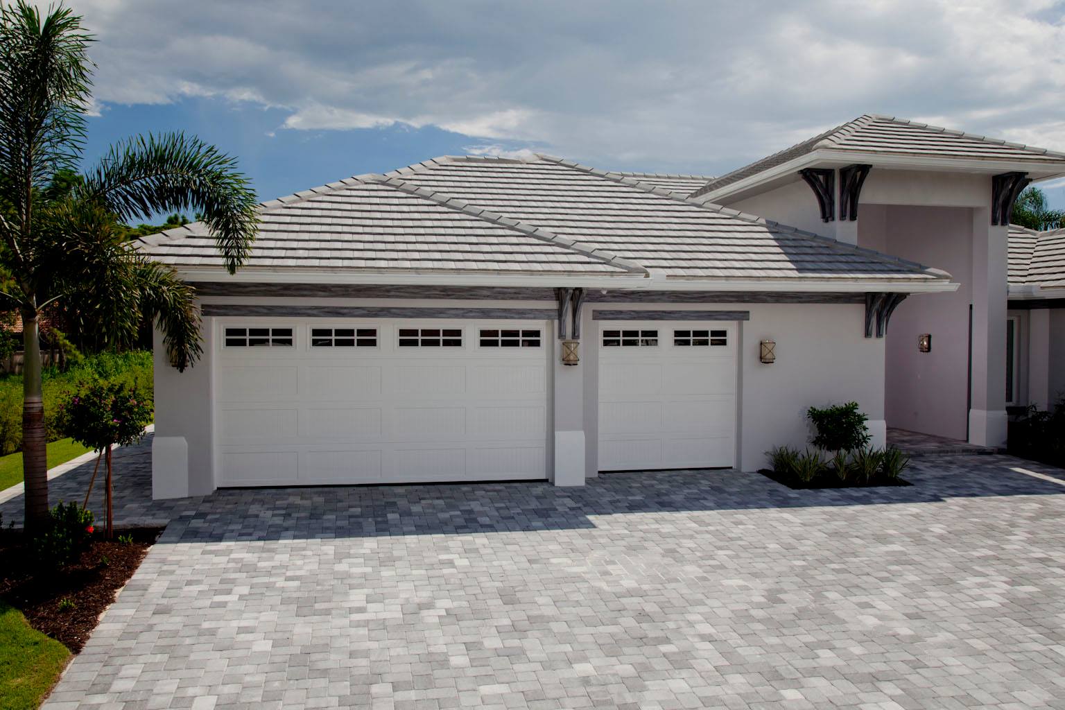 Beautiful House With White Garage Door — Naples FL — Garage Doors of Naples