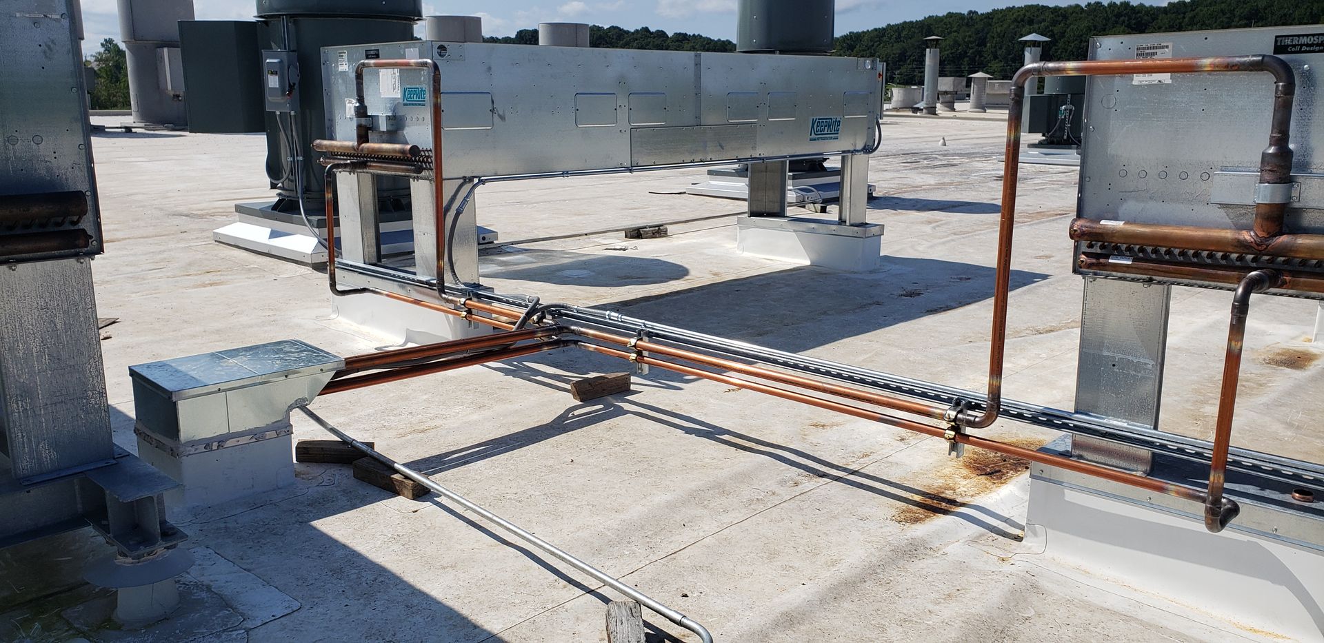 A roof with a lot of pipes on it