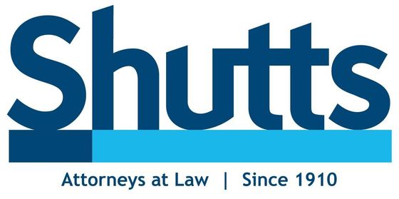 The logo for shutts attorneys at law since 1910