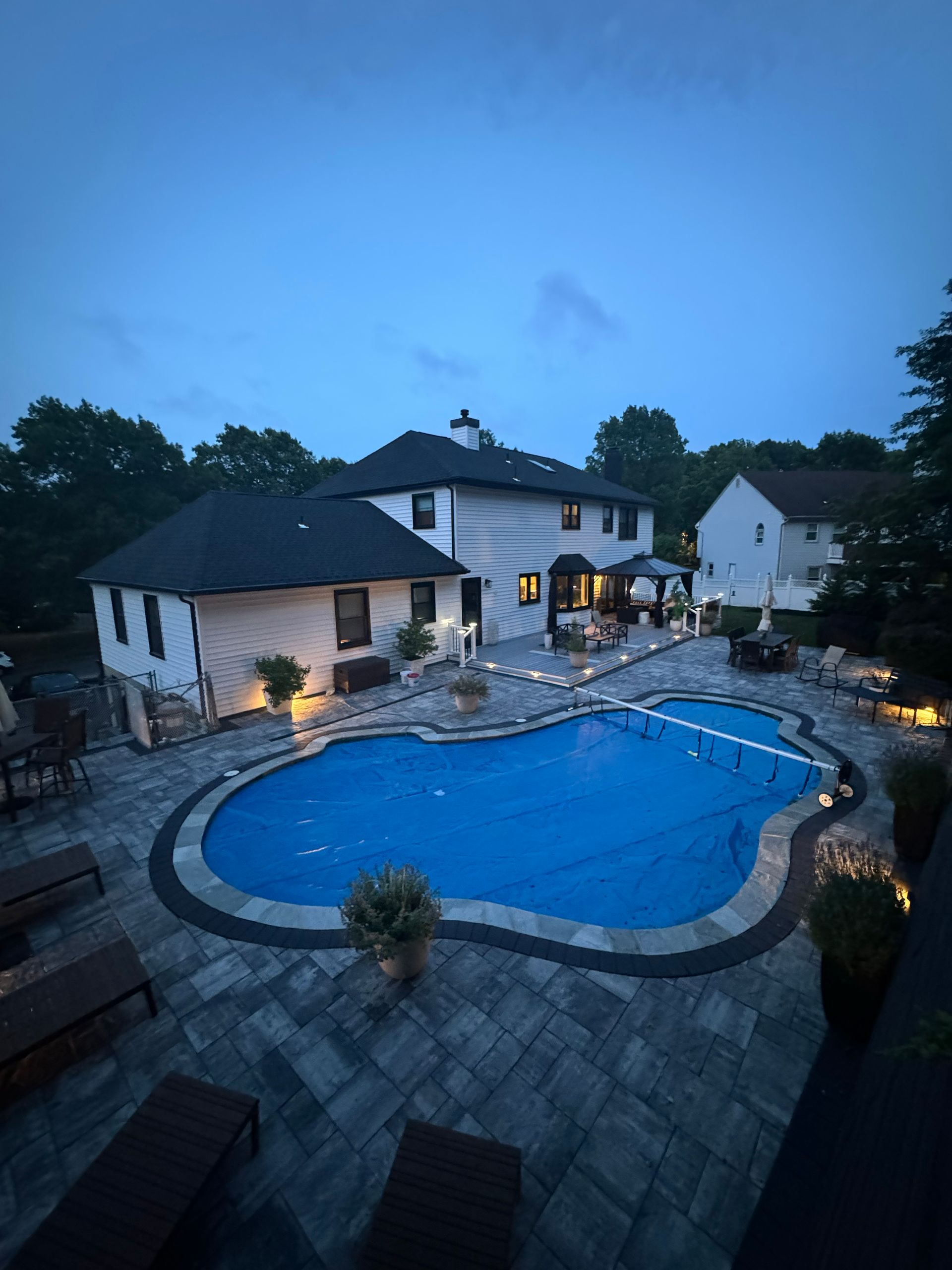 Residential property exterior photographed at dusk