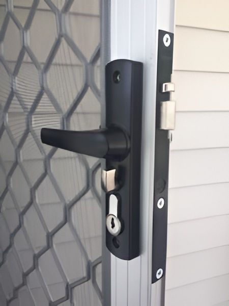 Black Security Screen Door Handle and Lock on a Metal Frame — All Security Screens & Repairs In Bungalow, QLD