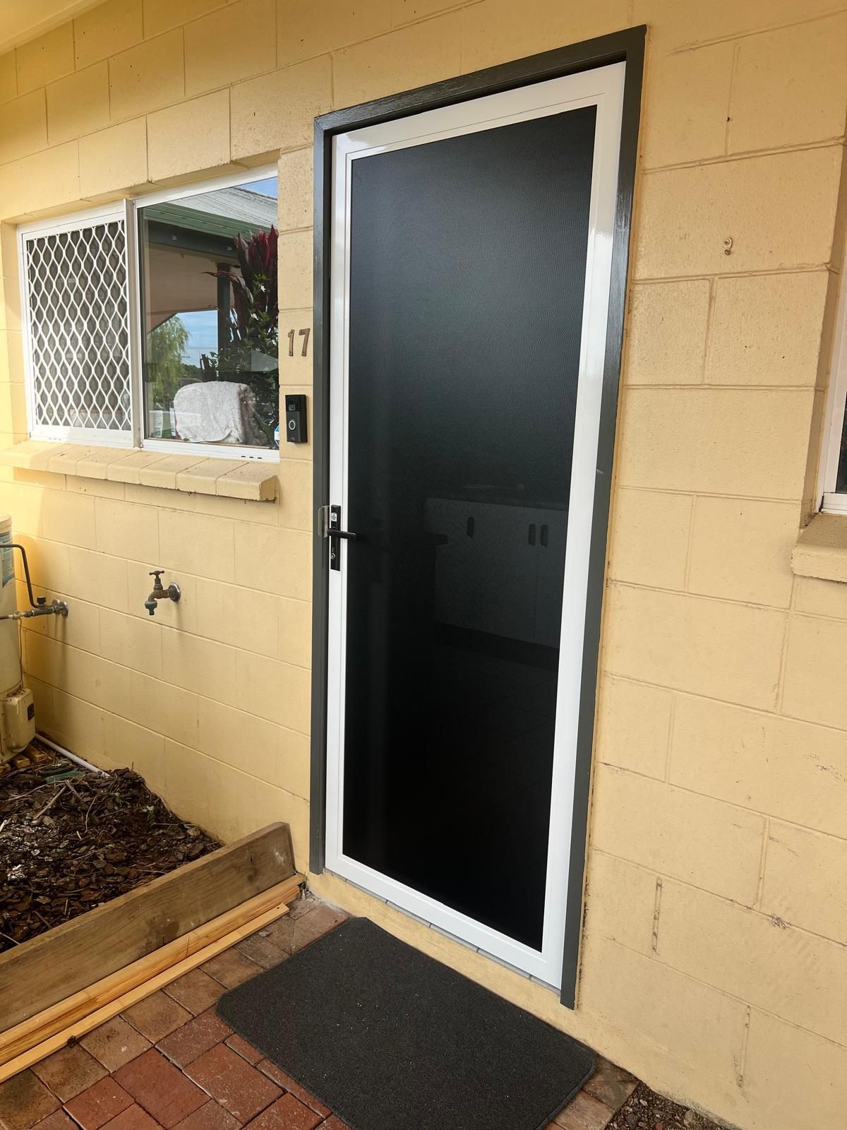 Screen Door With White Frame and Black Mesh — All Security Screens & Repairs In Bungalow, QLD