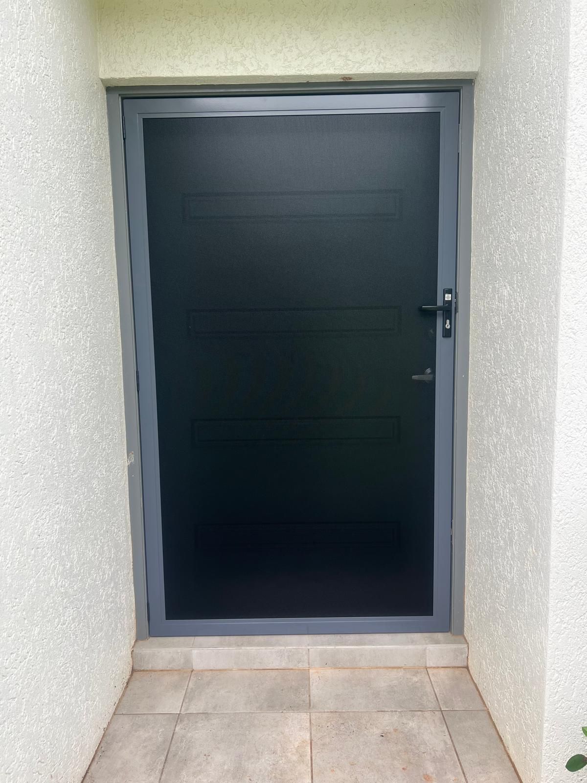 Dark Grey Security Door Set in Grey Frame, Front Entryway — All Security Screens & Repairs In Bungalow, QLD