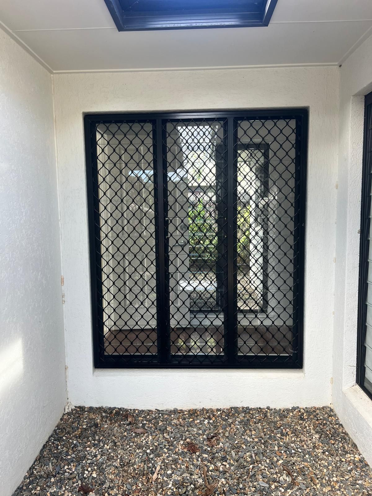Black-Framed Window With Security Screen — All Security Screens & Repairs In Bungalow, QLD