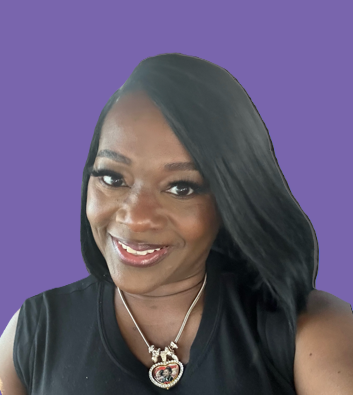 A woman wearing a black shirt and a necklace is smiling.