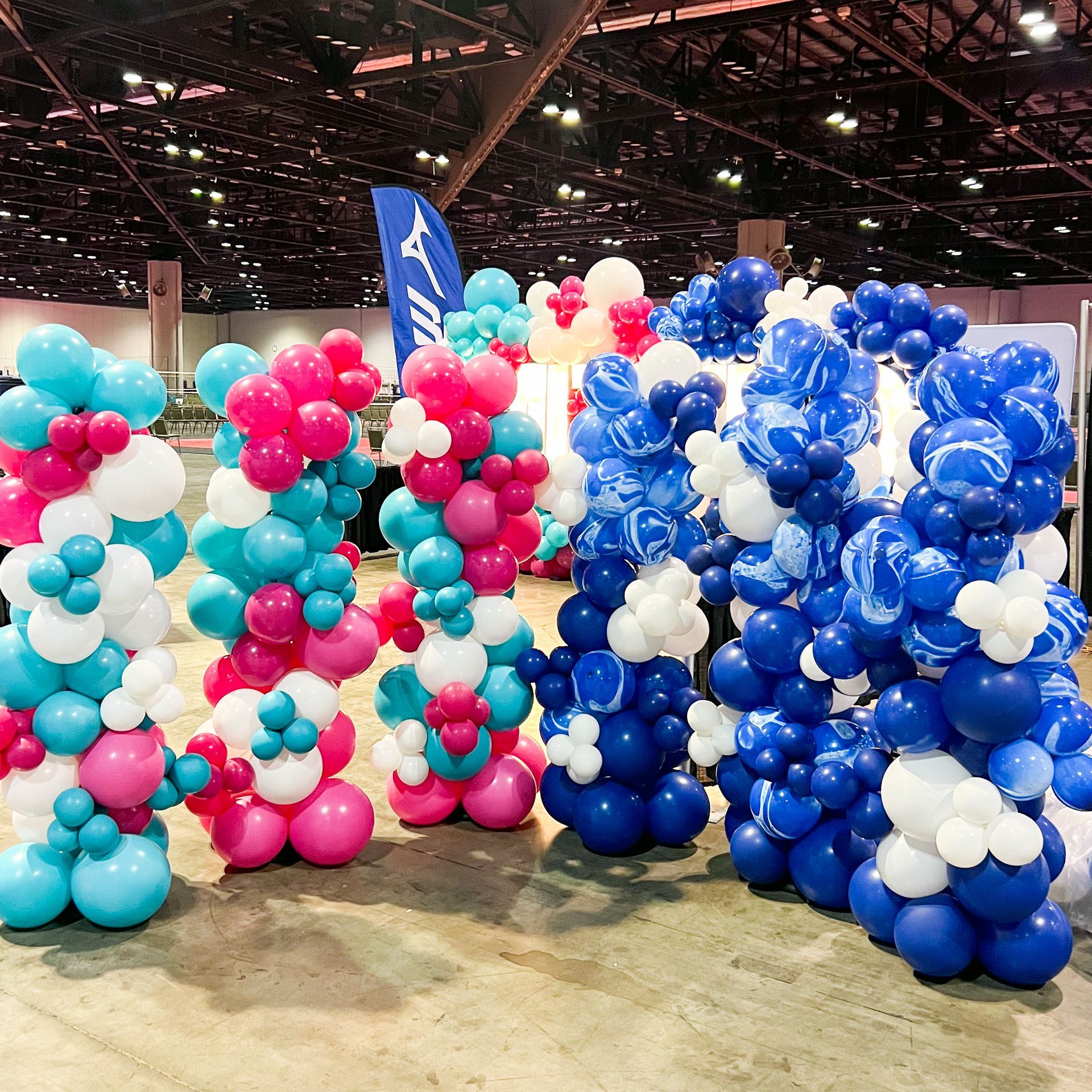 A bunch of balloons are stacked on top of each other
