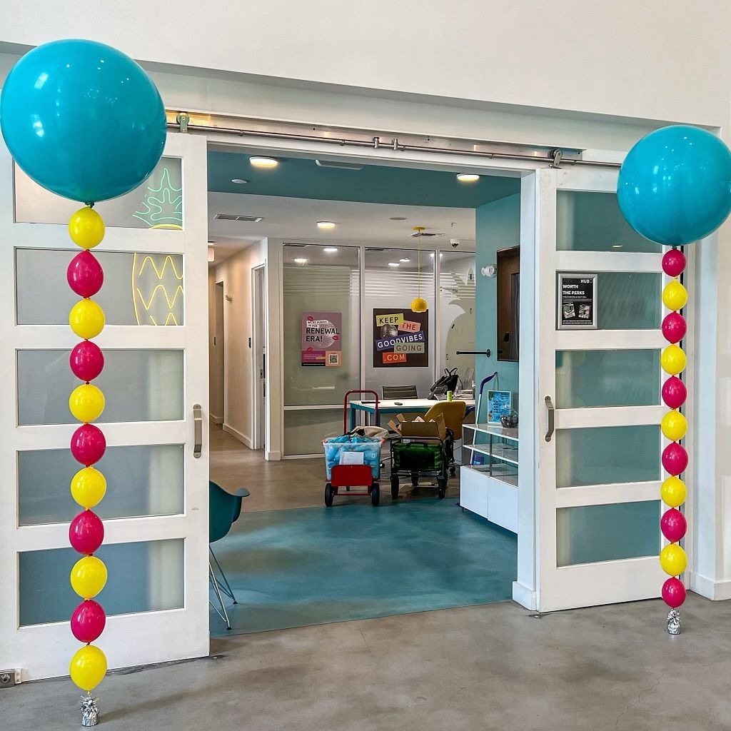 A room with a lot of balloons in it