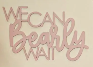 a pink sign that says we can easily wait