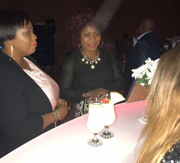 two women ordering cocktails at the bar